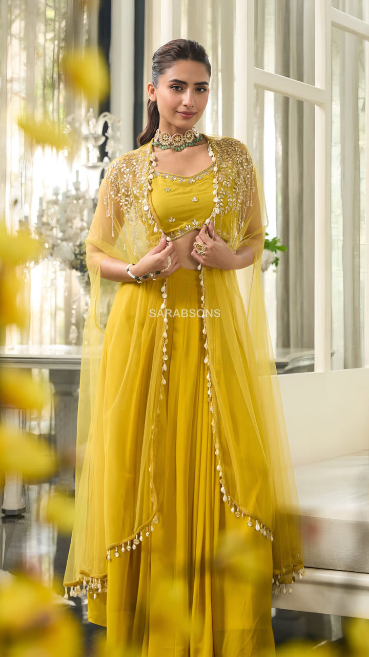 Mustard Yellow Indo-Western Spaghetti Strap Crop Top Draped Skirt with Cape Set
